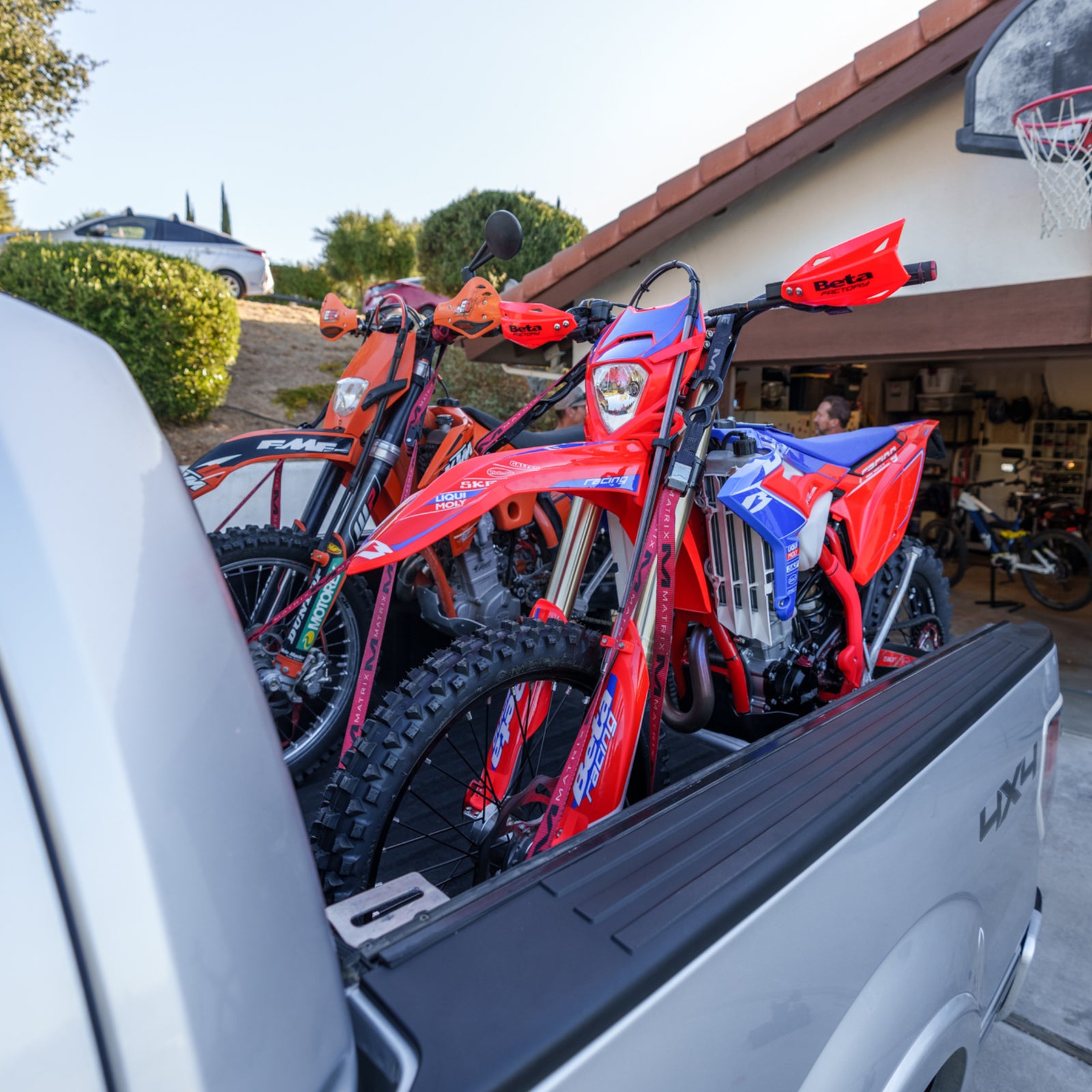 Ford F-Series 2 dirt bike and bicycle tool free tie down system