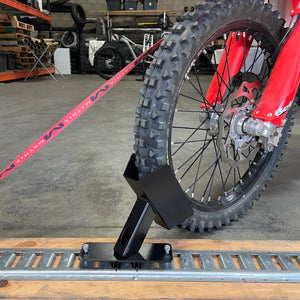 Motorcycle floor mounted wheel chock