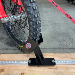 L-Track floor mount wheel chock for dirt bikes, sport bikes, bicycles and fat tire e-bikes