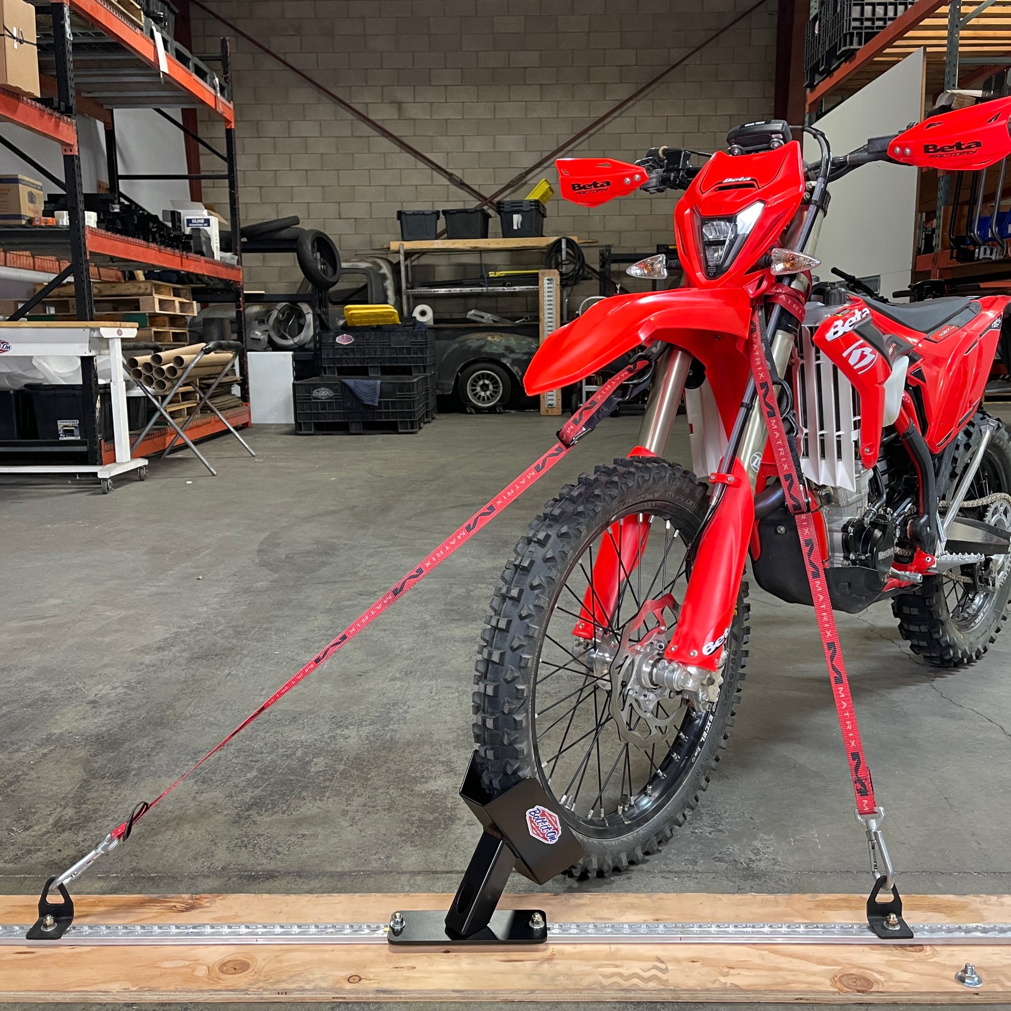 L-Track floor mount wheel chock for dirt bikes, sport bikes, bicycles and fat tire e-bikes